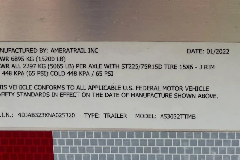Slide: The Image of Trailer label by Ameratrail Inc, GVWR 6895 kg, manufactured 01/2022, model AS3032TTMB. - 27
