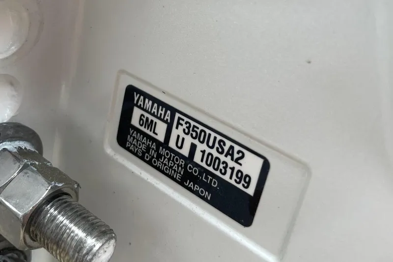 Slide: The Image of Yamaha engine label on Jupiter 32, model year 2023, showing specifications and origin. - 29
