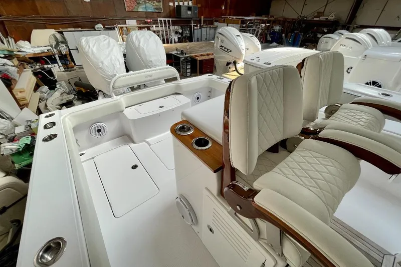 Slide: The Image of 2023 Jupiter 32 boat interior with luxurious seating and modern design features. - 5