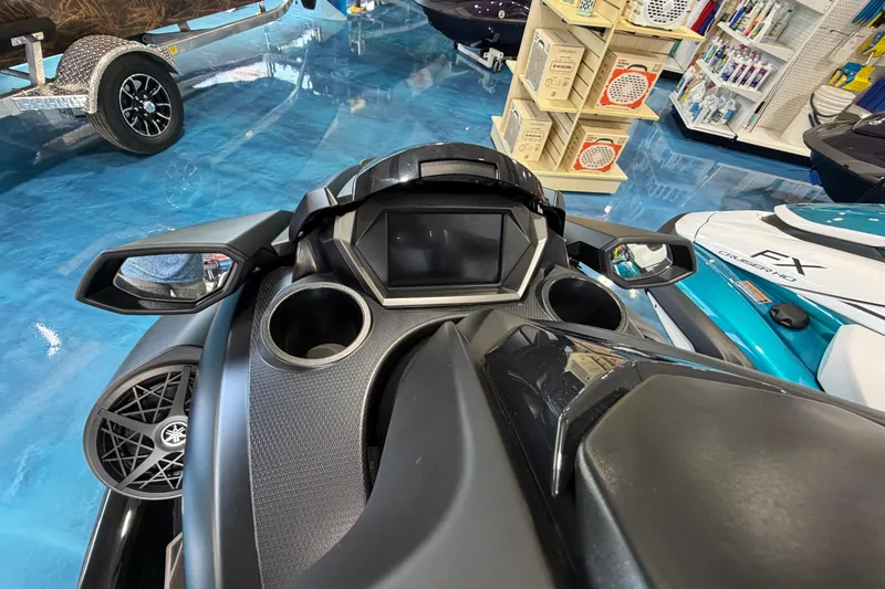 Slide: The Image of 2026 Yamaha WaveRunner FX dashboard with sleek design and advanced controls in showroom setting. - 3