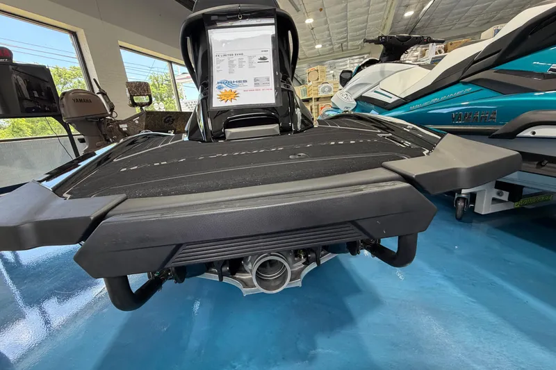 Slide: The Image of 2026 Yamaha WaveRunner FX on display in a showroom, rear view. - 6