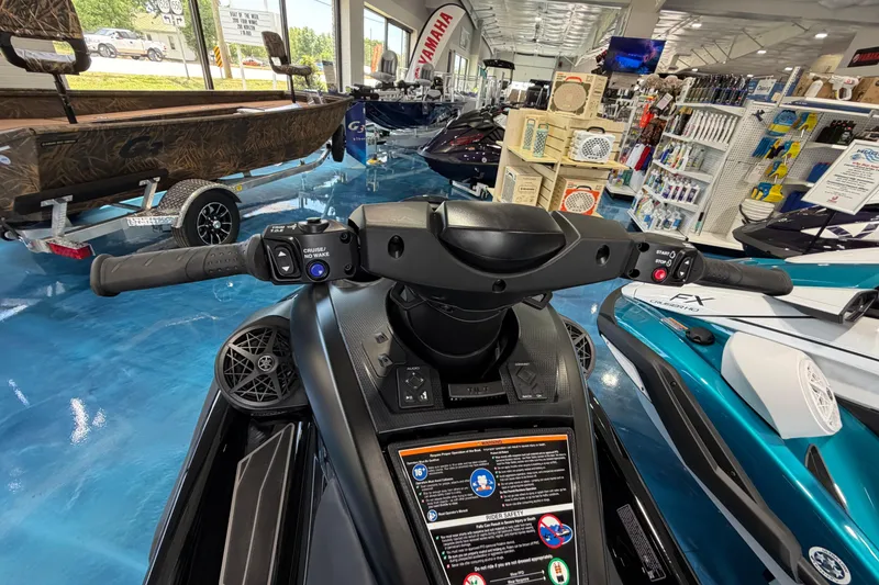 Slide: The Image of 2026 Yamaha WaveRunner FX dashboard in showroom, featuring controls and safety instructions. - 7