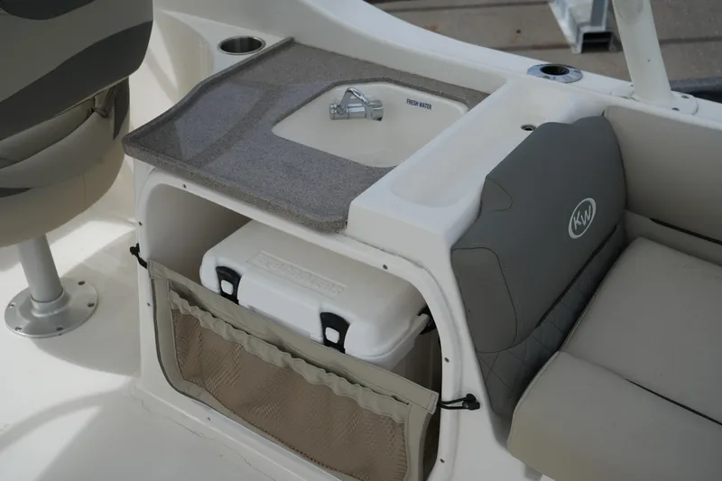 Slide: The Image of Interior of 2026 Key West 239 DFS boat with sink and storage area. - 14