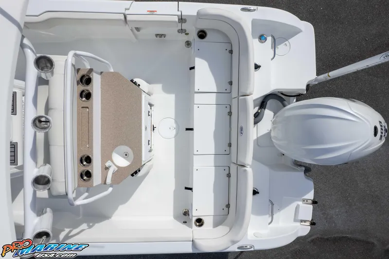 Slide: The Image of 2023 Sea Hunt Escape 23 boat interior with seating and engine, top view. - 25