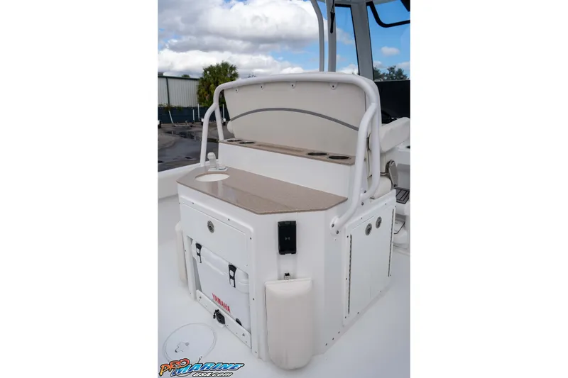 Slide: The Image of 2023 Sea Hunt Escape 23 boat interior with seating and storage compartments. - 43