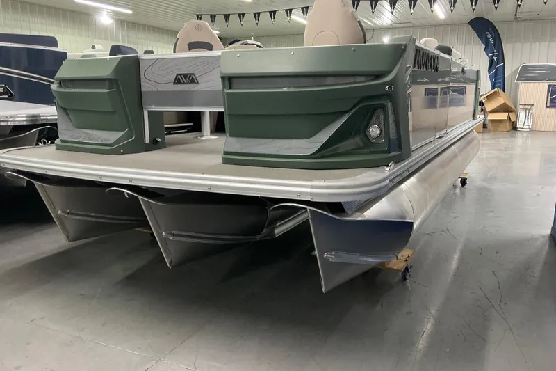 The Image of 2026 Avalon Geofish QF pontoon boat in showroom, showcasing sleek design and modern features. - 0