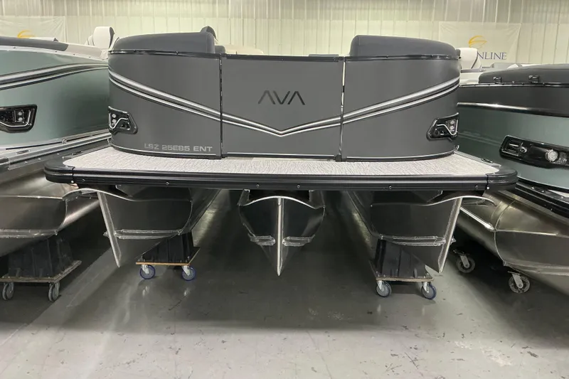 The Image of 2026 Avalon LSZ ENTERTAINER pontoon boat in showroom, front view. - 1