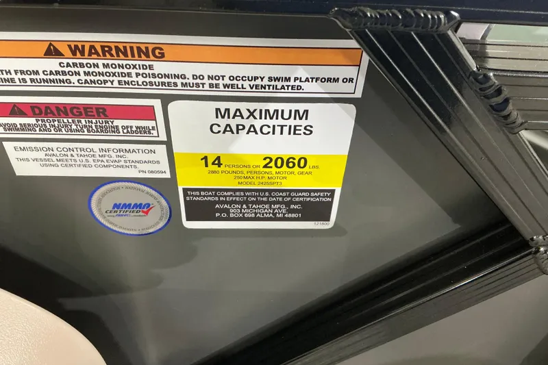 Slide: The Image of Warning and capacity labels on 2026 Avalon LSZ Entertainer boat, indicating safety and weight limits. - 3