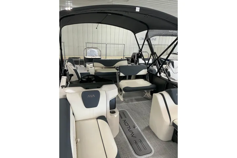 Slide: The Image of 2026 Avalon LSZ Entertainer boat interior with luxurious seating and modern design. - 5