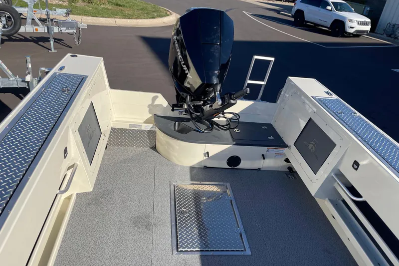Slide: The Image of 2026 Hewescraft 200 Pioneer boat interior with Mercury outboard motor. - 6