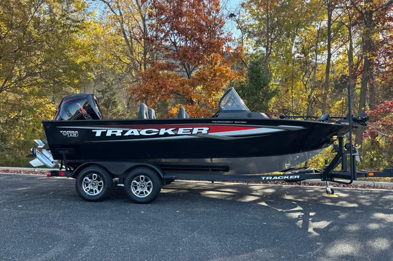 Slide: The Image of 2026 Tracker Targa V-19 Combo boat with sleek design and comfortable seating. - 5