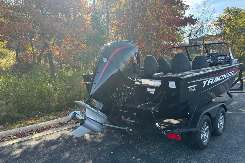 Slide: The Image of 2026 Tracker Targa V-19 Combo boat interior layout, featuring seating and storage compartments. - 6