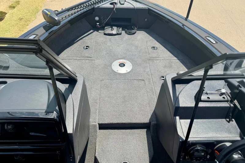 Slide: The Image of 2026 Tracker Targa V-19 WT boat interior with spacious deck and modern features. - 11