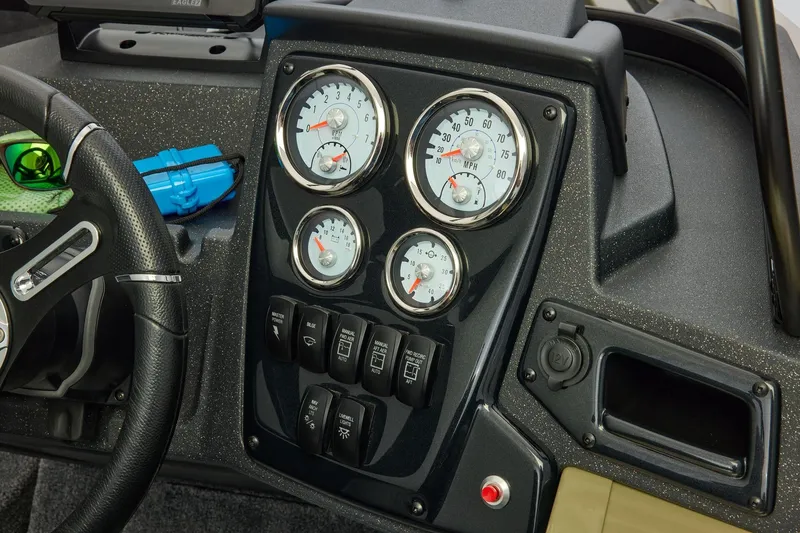 Slide: The Image of Dashboard of 2026 Tracker Targa V-19 Combo boat with gauges and controls. - 26
