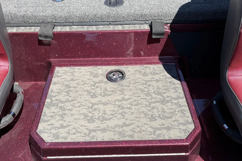 Slide: The Image of 2026 Nitro Z21 XL Pro boat interior with camo-patterned hatch and red accents. - 36