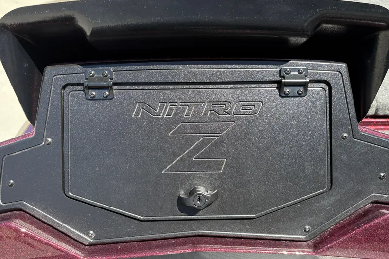 Slide: The Image of 2026 Nitro Z21 XL Pro boat compartment with logo and secure latch. - 28