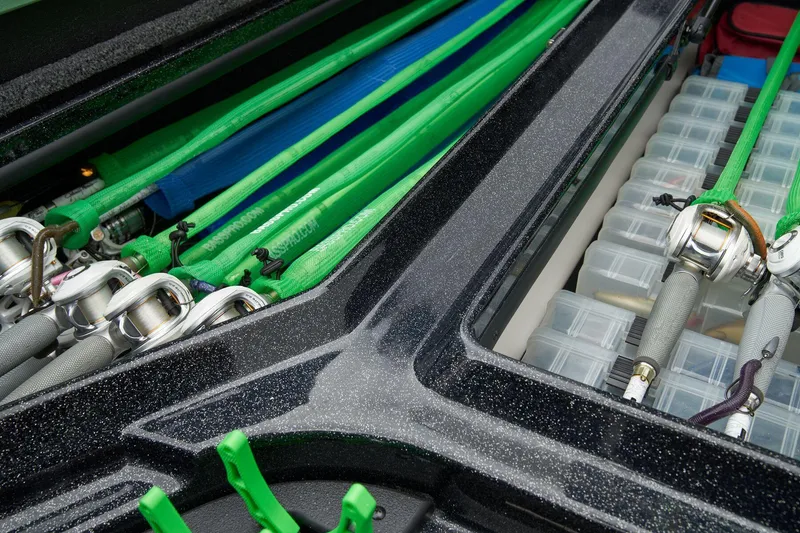 Slide: The Image of 2026 Nitro Z21 XL Pro boat storage compartments with open lids, showcasing interior space. - 21