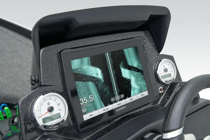 Slide: The Image of 2026 Nitro Z21 XL Pro boat trailer with winch and hitch, parked outdoors. - 34