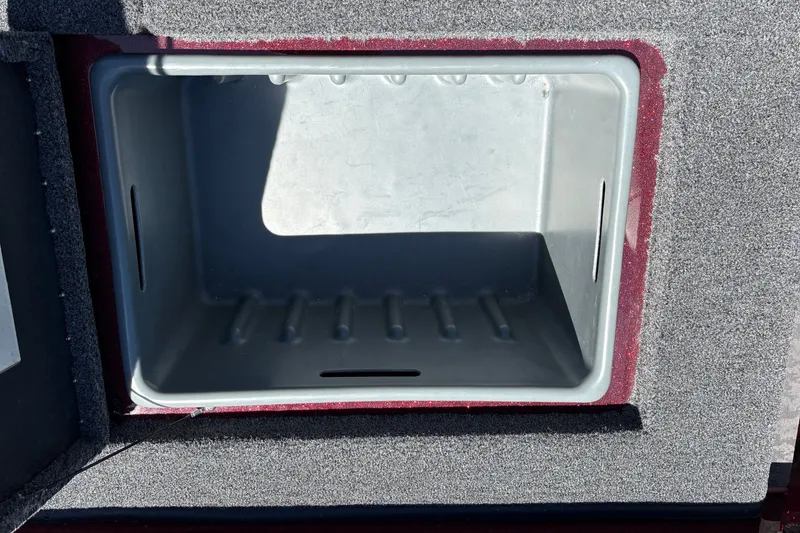Slide: The Image of Open storage compartment in 2026 Nitro Z21 XL Pro boat, featuring a spacious interior. - 30