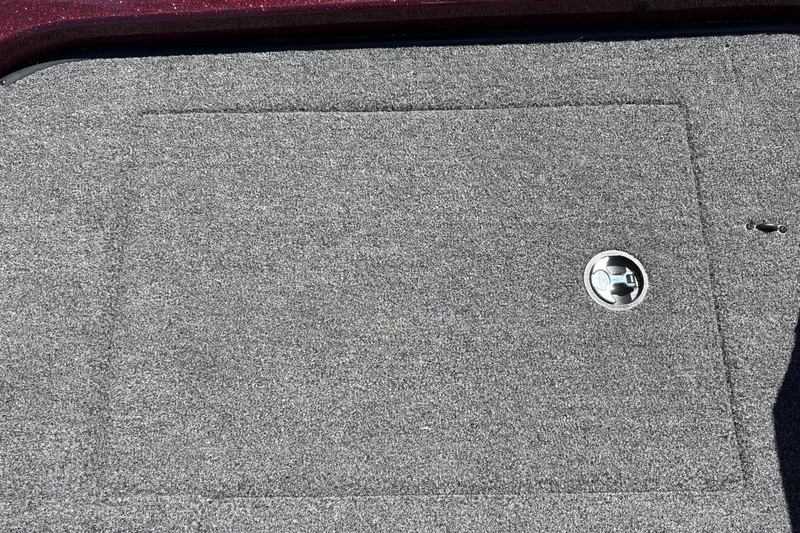 Slide: The Image of Carpeted storage compartment on 2026 Nitro Z21 XL Pro boat deck. - 44