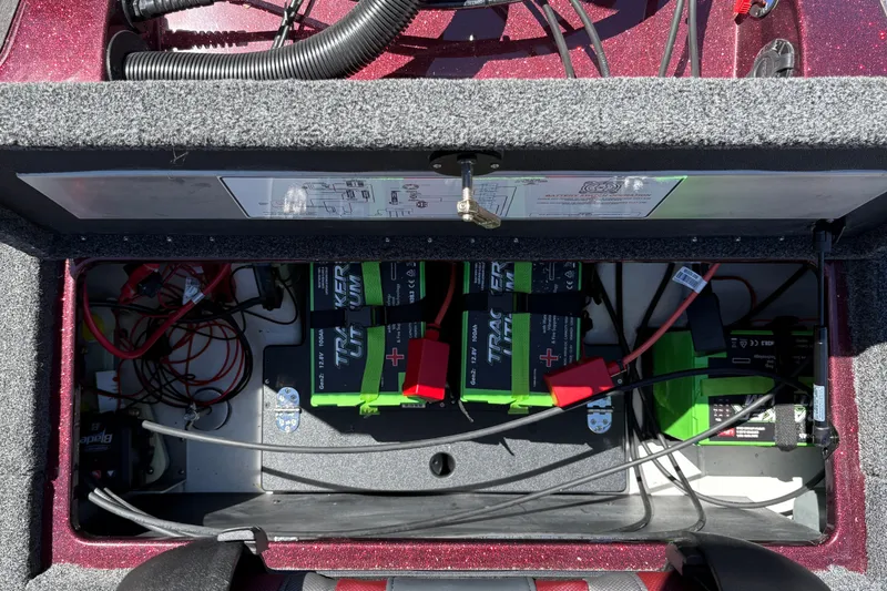 Slide: The Image of Battery compartment of 2026 Nitro Z21 XL Pro boat, featuring Tracker lithium batteries. - 31