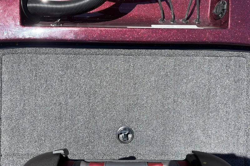 Slide: The Image of 2026 Nitro Z21 XL Pro boat deck with carpet and storage compartment. - 43