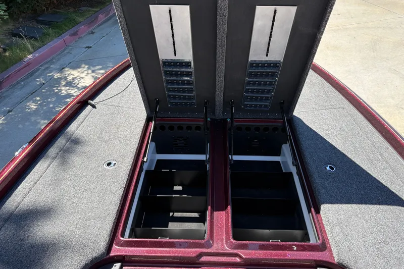 Slide: The Image of 2026 Nitro Z21 XL Pro boat storage compartments open, showcasing organized interior layout. - 17