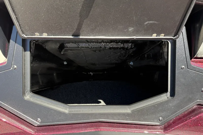Slide: The Image of Open storage compartment of 2026 Nitro Z21 XL Pro boat, showcasing interior space. - 26