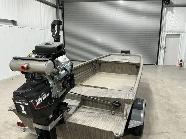 Slide: The Image of 2026 Gator Tail 1754 Extreme Rear Dual Pods boat in a garage setting. - 4