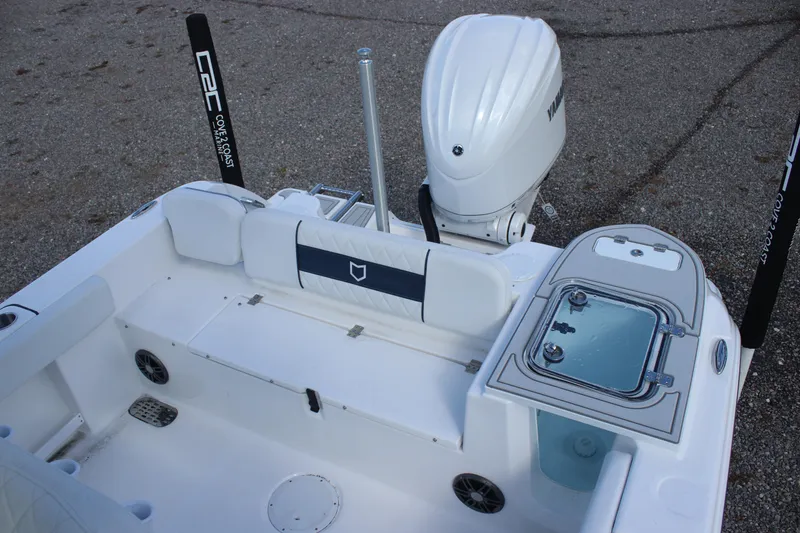 Slide: The Image of 2026 Sea Fox 248 Commander boat with Yamaha outboard motor, featuring spacious seating and storage. - 10