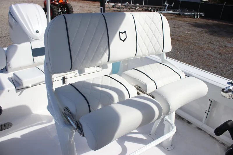 Slide: The Image of 2026 Sea Fox 248 Commander boat seating with white quilted upholstery. - 18