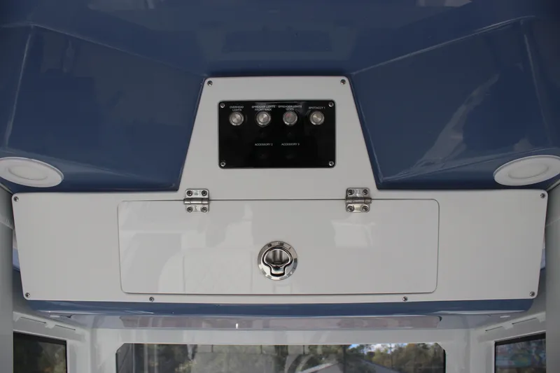 Slide: The Image of 2026 Sea Fox 248 Commander console with control panel and storage compartment. - 21