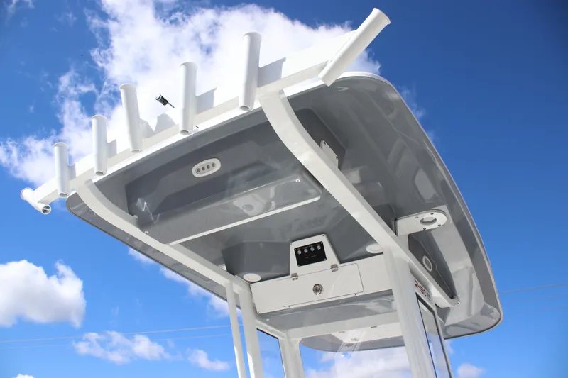 Slide: The Image of 2026 Sea Fox 248 Commander boat top view against blue sky. - 15
