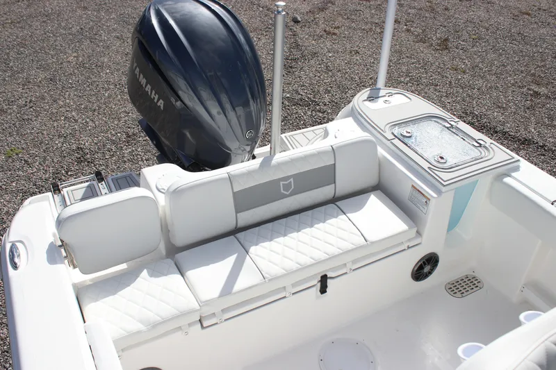 Slide: The Image of 2026 Sea Fox 248 Commander boat interior with Yamaha engine and cushioned seating. - 19
