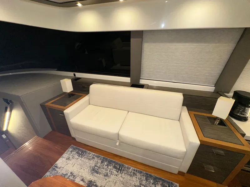Slide: The Image of Luxurious interior of 2020 Tiara Yachts F53 Flybridge with modern furnishings and elegant lighting. - 10