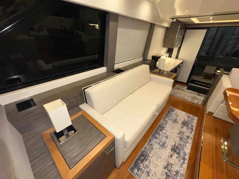 Slide: The Image of Luxurious interior of 2020 Tiara Yachts F53 Flybridge with modern furnishings and elegant design. - 13
