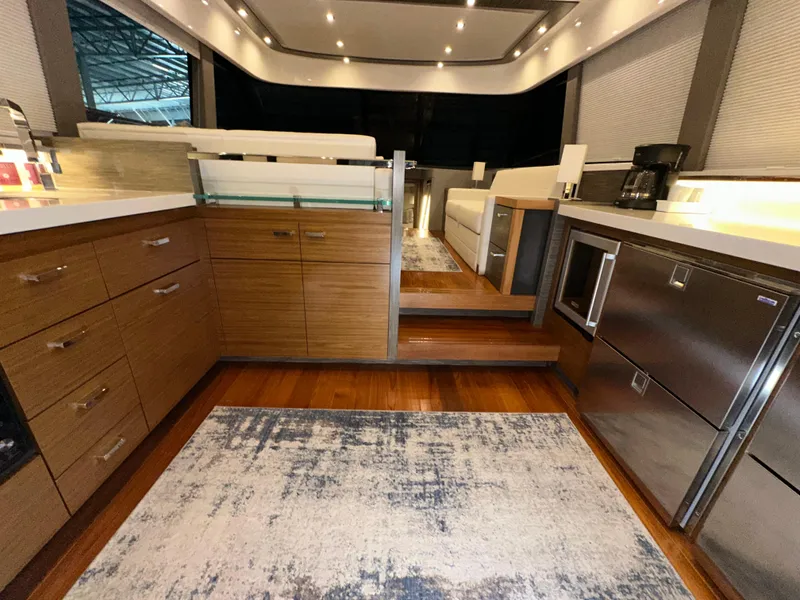 Slide: The Image of Luxurious interior of 2020 Tiara Yachts F53 Flybridge with modern kitchen and elegant design. - 41