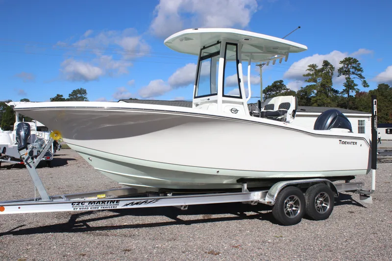 The Image of 2026 Tidewater 220 LXF boat on trailer under clear blue sky. - 0