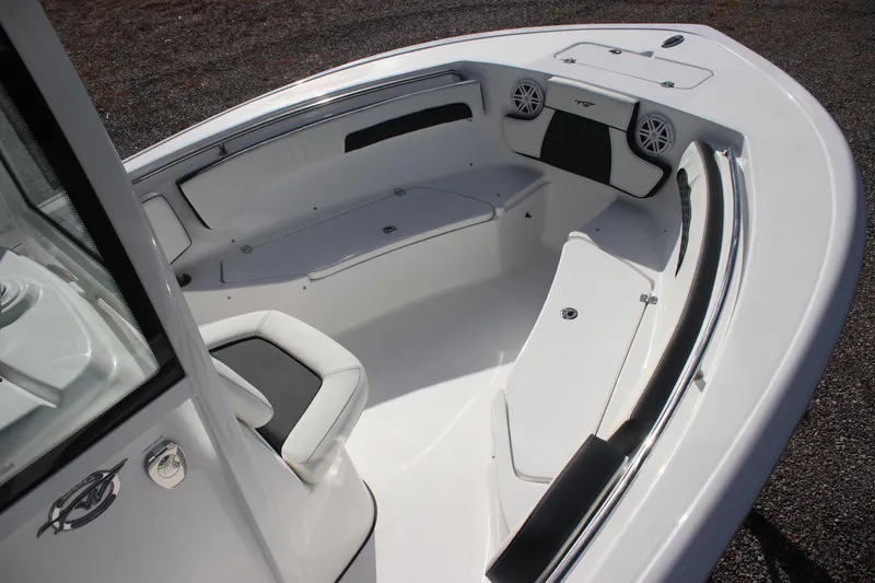 Slide: The Image of 2026 Tidewater 220 LXF boat interior with seating and speakers. - 10