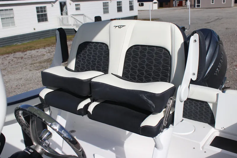Slide: The Image of 2026 Tidewater 220 LXF boat seats with black and white upholstery, featuring a stylish design. - 13
