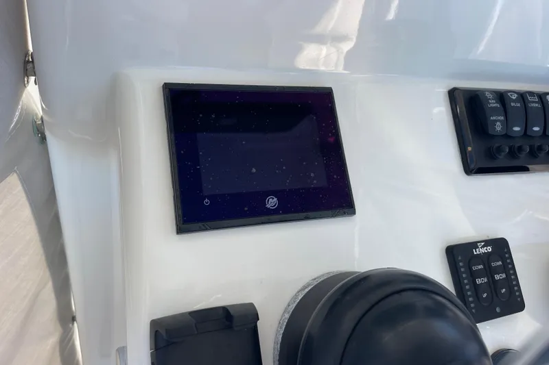 Slide: The Image of 2023 Pair Customs 24 Center Console DV dashboard with touchscreen and control panel. - 19