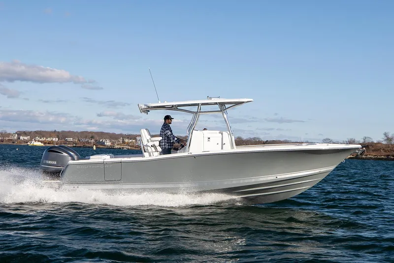 Slide: The Image of Manufacturer Provided Image: 2025 Southport 27 FE boat cruising at sunset with dual Yamaha engines. - 0