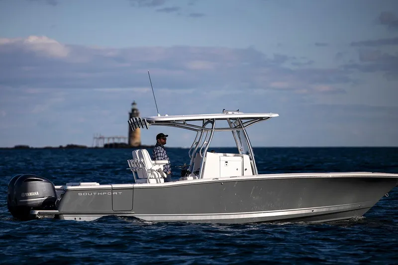 Slide: The Image of Manufacturer Provided Image: 2025 Southport 27 FE boat cruising on open water, side view. - 2