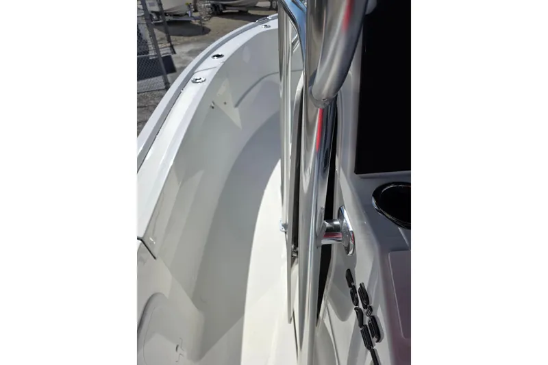 Slide: The Image of 2026 Parker 210 Coastal boat interior with sleek design and stainless steel railing. - 15