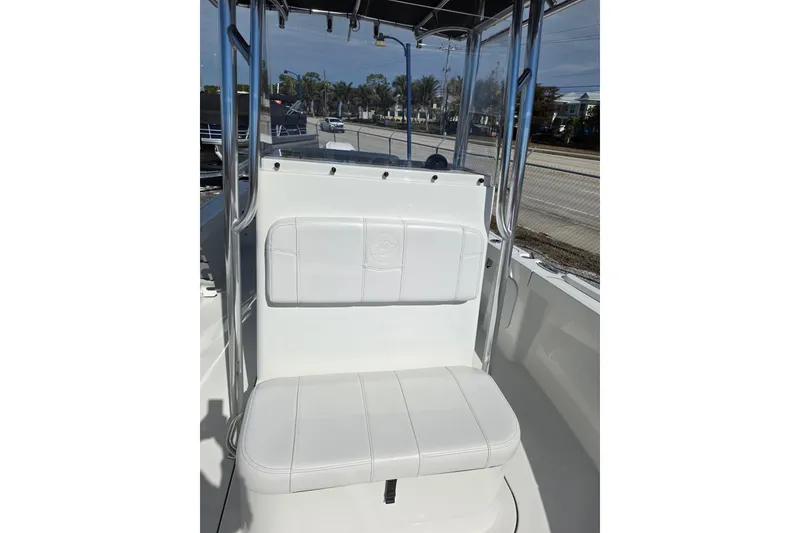 Slide: The Image of 2026 Parker 210 Coastal boat interior with white seating and console. - 20