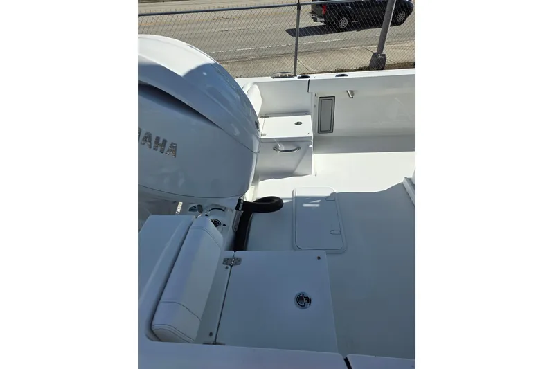 Slide: The Image of 2026 Parker 210 Coastal boat interior with Yamaha engine, showcasing sleek design and functionality. - 9