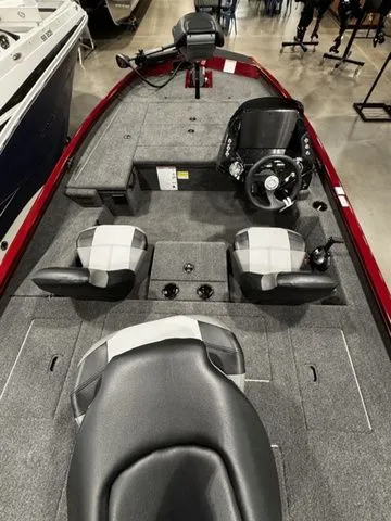 Slide: The Image of 2025 Crestliner XFC 179 boat interior with dual seats and steering console. - 4