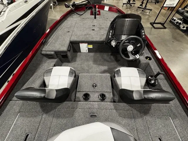 Slide: The Image of 2025 Crestliner XFC 179 boat interior with dual seats and steering console. - 5