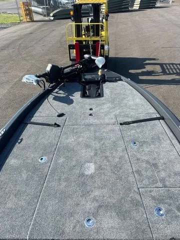 Slide: The Image of 2026 Phoenix Bass Boats 921 Elite X with spacious deck and trolling motor. - 4