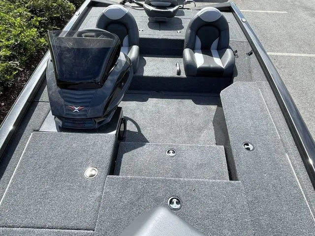 Slide: The Image of 2023 Vexus AVX181 boat interior with seating and storage compartments. - 11